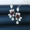 Pendientes de lujo ligeros y personalizados de plata s925 con forma redonda de gota de agua y circonitas a juego, de alta gama para mujer.