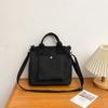 Bolso de mano de lona con diseño de nicho de estilo literario original de Corea del Sur, bolso de viaje de negocios para mujer, bolso de mensajero informal y sencillo.