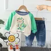 Diseño de Color Contrastante Otoño Cuello Redondo Estampado de Animales de Dibujos Animados Sudadera de Manga Larga y Jeans Traje de Dos Piezas Fabricante Venta al por Mayor