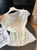 Top de punto fino con cuello hueco de seda helada de manga corta para mujer, nuevo look de dos piezas de moda de verano 2026, elegante y moderno