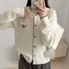Cárdigan de punto con bloques de color estilo tweed color mapache para mujer, nueva colección otoño/invierno 2026, suéter de manga larga con bolsillos falsos