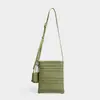 Bolso tejido a mano nuevo de nicho con diseño calado y sensación de alta gama, bolso de paja estilo vacacional, bolso de playa, bolso bandolera tipo cubo