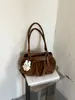 Bolsa de ombro estilosa com laço transfronteiriça para mulheres, nova versão coreana, bolsa de mão moderna para o dia a dia, bolsa de ombro de alto valor, na moda
