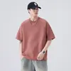 Camiseta de manga corta estilo americano para hombre, nuevo modelo de verano 2026, simple y sofisticada, color liso, cuello redondo, corte holgado, top de manga corta