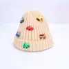 En stock Gorro de punto para niños Otoño e invierno nuevo original cochecito pequeño elegante cálido gorro de lana Versátil tocado Transfronterizo