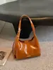 Bolsa de Axila Feminina 2026 Novo Estilo Tendência Outono Nicho Super Popular Exquisita Bolsa de Ombro Único Bolsa Transversal para o Dia a Dia