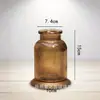 Venta al por mayor de jarrones de vidrio sodo-cálcico transfronterizos, frascos de vidrio para almacenamiento, decoraciones de sala de estar de diseño de lujo ligero de alta gama, jarrones para flores hidropónicas