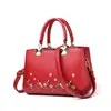 Bolso Nuevo para Mujer 2023 Moda Europea y Americana Bolso de Hombro Bordado Bolso de Mano para Mujer PU Bolso Grande de Exportación Bolso para Mamá Dropshipping