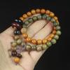 Sándalo verde 0.8 doble color doble círculo cuentas anillo corredizo pulsera DIY joyería al por mayor