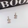 Moda coreana temperamento aleación retención de color chapado diamante circón mano joyería pulsera pendientes accesorios materiales
