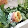 Tienda de fábrica nuevos accesorios para el cabello para niños al por mayor bebé básico banda de goma banda para el cabello cuerda para el cabello