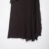 Exportación al por mayor Ropa de mujer 2026 Primavera Estilo europeo y americano Empalme Dobladillo asimétrico Color liso Falda Gama alta Ins