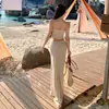 Traje Estilo Vacaciones en la Playa para Mujer 2026 Nuevo Estilo Conjunto de Dos Piezas con Top de Tubo Falda Larga a Cuadros de Cintura Alta que se Ajusta a la Cadera