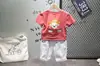 Verão 2019 nova camiseta infantil de desenho animado com personalidade ZY1905 calça jeans rasgada com cinto ZY853