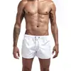Nuevos pantalones de fitness de verano transfronterizos europeos y americanos para hombre, cómodos, transpirables, de color sólido, para correr, deportes de ocio y entrenamiento.