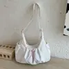 Mochila versátil estilo coreano com cordão e pregas, grande capacidade, para outono de 2026, nova moda, também pode ser usada como bolsa de ombro e bolsa transversal.