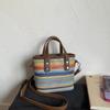 Moda de Vacaciones de Playa Tejida Versátil de Paja Bolso de Hombro Cruzado Bolso Cubo Nuevo de Verano 2026