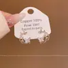 Pendientes de Lazos Microincrustados de Circonita de Venta Caliente Estilo Coreano 2026 para Mujer, Aguja de Plata S925, Pendientes de Perla de Botón de Gama Alta Nicho