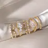 Juego de anillos Wanxing estilo europeo y americano para mujer, con oro de 18 quilates y acero inoxidable, con acentos de circonita cúbica geométrica, un diseño versátil y clásico, disponible para venta al por mayor transfronteriza