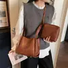 Bolsa Tote Retrô Transfronteiriça para Mulheres 2026 Nova Coleção de Primavera Casual Grande Capacidade Bolsa de Ombro de Mão Bolsa Transversal para o Dia a Dia