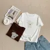 Camiseta de manga corta versátil estilo coreano con estampado de cachorro de dibujos animados para mujer, cuello redondo, corte regular, efecto adelgazante, 95% algodón, hace que la piel luzca más clara, top básico