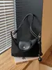 Bolso de axila de estilo francés de nicho transfronterizo para mujer, nuevo bolso de moda tipo albóndiga de gamuza para el trabajo, bolso de hombro y cruzado casual