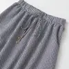 Falda Midi de Cuadros Pequeños Elástica Elegante para Mujer Estilo Europeo y Americano Transfronterizo Moda Nueva 2026 Venta al por Mayor 5029063