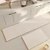 Alfombrilla de suelo de tierra de diatomeas estilo nórdico minimalista transfronteriza, resistente a la suciedad y fácil de limpiar, alfombrilla de cocina, juego de dos piezas de tira larga, alfombrilla para pies de cocina