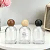 Botella de Vidrio para Perfume de 100 ml al por Mayor del Fabricante, Portátil de Alta Gama, Recargable, Gran Capacidad, Atomizador de Presión, Botella Vacía