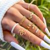Anillo de moda de venta caliente transfronterizo conjunto de anillo de flor hueca anillo simple hoja lisa Vid anillo de perla de imitación juego de 10 piezas