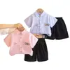 Conjunto de Ropa de Verano para Niños Nuevo de Moda Estilo Coreano Camisa de Manga Corta a Rayas Conjunto de Dos Piezas para Niños Pequeños, Venta al por Mayor para Comercio Exterior