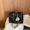 Bolsa feminina casual transfronteiriça 2026 novo modelo versátil para o dia a dia grande capacidade estilo coreano moda tendência popular bolsa de ombro tote