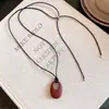 Colar com Cordão de Couro Estilo Coreano Pingente Oval Design de Nicho Versátil Corrente para Suéter Colar para o Dia a Dia para Mulheres
