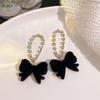 Aretes de lazo retro francés largos con clip para la oreja sin perforación nuevo temperamento moderno Hepburn popular en línea populares aretes femeninos