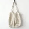 Bolsa de palha tecida para mulheres, grande capacidade, nova coleção primavera/verão 2026, design casual versátil, padrão vazado, bolsa de ombro, perfeita para férias na praia