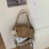Nueva bolsa tipo almohada transfronteriza, gran capacidad, bolso de hombro elegante y moderno, sensación de alta gama 2026, adecuado para el trabajo y los desplazamientos, bolso de axila para mujer