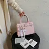 Bolso bandolera de nicho de alta gama estilo coreano 2026, nuevo bolso de hombro de moda de verano para commuting, bolso de mano simple y único