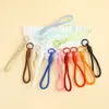 Llavero de Peluche de Cuerda Tejida a Mano de Color Sólido Lanyard Corto Portátil para Teléfono Colgante Decorativo para Bolso