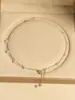 Collar de Mariposa con Perlas y Borlas, Diseño de Nicho de Lujo Ligero, Collar Versátil de Circonita de Gama Alta, Nueva Cadena para Clavícula 2026