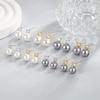 Pendientes sencillos para mujer, estilo coreano, estilo fresco, cuatro garras, un solo diamante, estilo Pearl Harbor, pequeños y elegantes, recién llegados, diamantes brillantes.