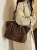 Bolso de axila retro de gran capacidad, bolso de hombro estilo coreano para mujer, nuevo diseño transfronterizo 2026, bolso tote simple y práctico para ir al trabajo
