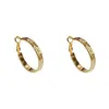 Brincos de Argola Grandes de Metal com Textura Exagerada Estilo Retrô Francês para Mulheres Design Elegante Fashionável Simples Senso de Design Brincos de Estilo Cool