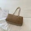 Retro estilo coreano, bolso de almohada de gamuza de nicho, nueva colección otoño 2026, color liso, moderno, gran capacidad, adecuado para ir al trabajo, y se puede llevar bajo el brazo