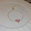 [Cadena de Diamantes Arcoíris] Pulsera de extracción de zircón trenzado en cruz, una pulsera lujosa y de alta gama, una pieza de joyería delicada y de moda