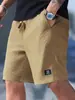 Pantalones cortos de punto gofrado para hombre, de verano, atléticos y casuales, de importación europea y americana, un artículo popular y de los más vendidos