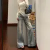 Chao Li tem em estoque jeans de lavagem desgastada microflare feminino perna dupla comprimento elástico slim fit versátil valoriza calças de perna larga comprimento total