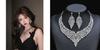 Juego de collar y aretes de gema artificial elegante de nueva moda europea y americana para mujer, aleación galvanizada, exclusivo transfronterizo, cadena para clavícula