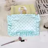 Bolsa de maquillaje nueva de satén de alta calidad con lindo diseño de volantes femeninos, bolsa de almacenamiento de lunares de gran capacidad