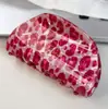 Pinza para el pelo de acetato sintético con estampado de leopardo rosa y diseño elegante, accesorio de lujo para el cabello con un toque avanzado