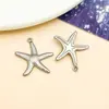 Acero inoxidable al vacío electrochapado color oro acero hueco estrella de mar, caballito de mar, caracola, pez tropical colgante accesorios para joyería DIY